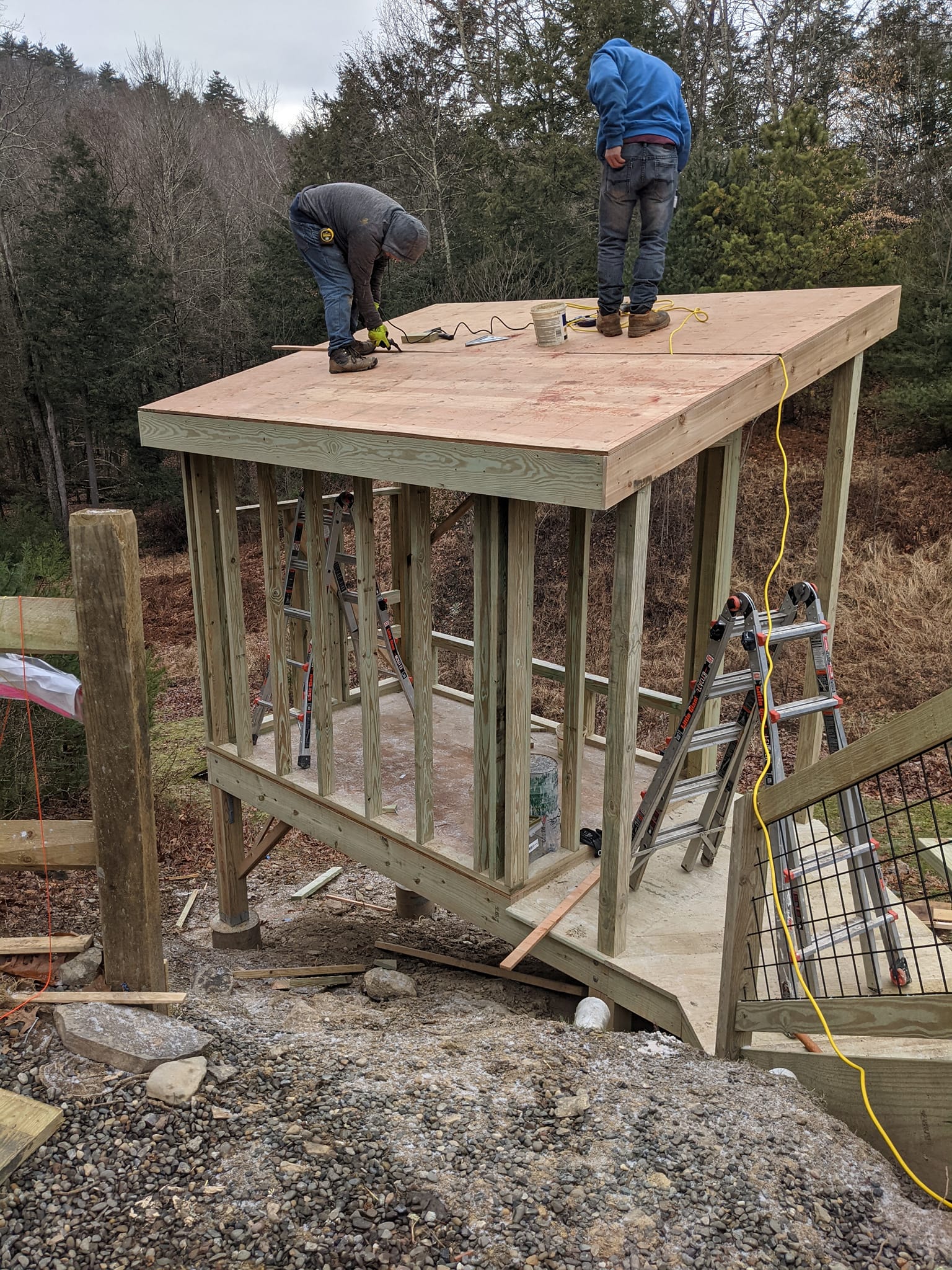 worker building cabin
